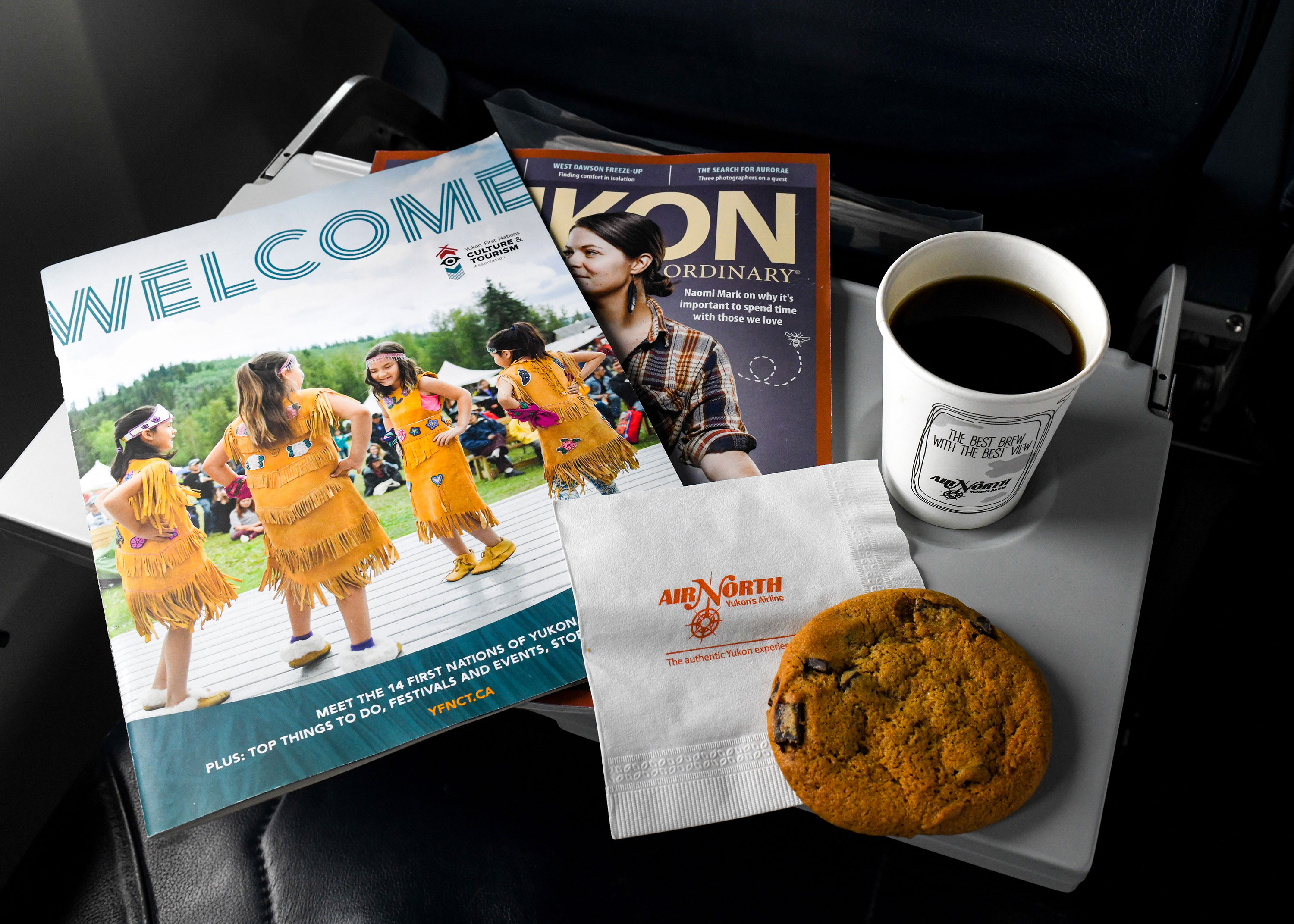 Tray with magazines, coffee and cookie