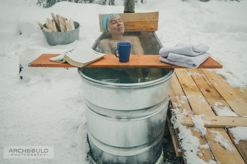 A person in a small hottub